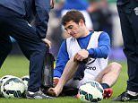 Everton's Leighton Baines appears to seek medical attention for a foot injury before the Barclays Premier League match at Goodison Park, Liverpool. PRESS ASSOCIATION Photo. Picture date: Saturday May 9, 2015. See PA story SOCCER Everton. Photo credit should read: Peter Byrne/PA Wire. RESTRICTIONS: Editorial use only. Maximum 45 images during a match. No video emulation or promotion as 'live'. No use in games, competitions, merchandise, betting or single club/player services. No use with unofficial audio, video, data, fixtures or club/league logos.