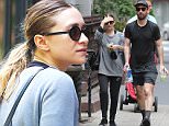 New York, NY - Actress and businesswoman Ashley Olsen is spotted walking with a good friend in the West Village after a sweaty gym session.  The petite blonde had her hair pulled back in a ponytail and was decked in gym attire as she covered her face. \nAKM-GSI        May 10, 2015\nTo License These Photos, Please Contact :\nSteve Ginsburg\n(310) 505-8447\n(323) 423-9397\nsteve@akmgsi.com\nsales@akmgsi.com\nor\nMaria Buda\n(917) 242-1505\nmbuda@akmgsi.com\nginsburgspalyinc@gmail.com
