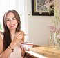 A stock photo of a woman pictured while eating her breakfast.



Smiling woman eating breakfast