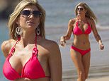Bright pink bikini wearing Alexis Bellino from "The Real Housewives of Orange County", is seen vacationing with her family in Hawaii.\n\nPictured: Alexis Bellino\nRef: SPL1032599  210515  \nPicture by: Splash News\n\nSplash News and Pictures\nLos Angeles: 310-821-2666\nNew York: 212-619-2666\nLondon: 870-934-2666\nphotodesk@splashnews.com\n