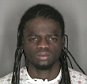 Suspect Daron Dylon Wint is pictured in this 2007 police booking photograph released on May 22, 2015. Wint, who is a suspect in the killing last week of Washington businessman Savvas Savopoulos, his wife, son and housekeeper, was arrested late on May 21, police said. REUTERS/Oswego County Sheriff's Department/Handout via Reuters  ATTENTION EDITORS - THIS IMAGE WAS PROVIDED BY A THIRD PARTY. FOR EDITORIAL USE ONLY. NOT FOR SALE FOR MARKETING OR ADVERTISING CAMPAIGNS. THIS PICTURE IS DISTRIBUTED EXACTLY AS RECEIVED BY REUTERS, AS A SERVICE TO CLIENTS