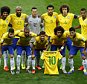 Marcelo holds the jersey of Neymar as Brazil's national team pose before their 2014 World Cup semi-finals against Germany at the Mineirao stadium in Belo Horizonte July 8, 2014.  REUTERS/Leonhard Foeger (BRAZIL  - Tags: SOCCER SPORT WORLD CUP)   - RTR3XO9H