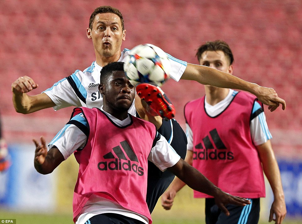 Nemanja Matic raises his boot to beat Jeremie Boga  on a humid early evening in Bangkok ahead of the game against Thailand All-Stars