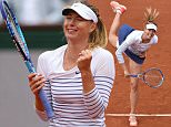 Russia's Maria Sharapova serves to Australia's Samantha Stosur during the women's third round at the Roland Garros 2015 French Tennis Open in Paris on May 29, 2015.  AFP PHOTO / PASCAL GUYOTPASCAL GUYOT/AFP/Getty Images
