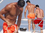 01.JUNE.2015  - ANTIBES - FRANCE 
*** AVAILABLE FOR UK SALE ONLY ***
CRISTIANO RONALDO ENJOYS HIS VACATION WITH MALE FRIENDS ON ONE OF SIR PHILIP GREEN'S YACHTS. THE REAL MADRID STRIKER LOOKS VERY VERY CLOSE TO MIGUEL PAIXAO AS HE ASK FOR THE OIL ON HIS BACK, HIS VERY BEST FRIEND...
WE REMEMBER THAT IT IS THIS SAME FAITHFUL AMONG THE FAITHFUL FRIEND WHO REPRESENTED CRISTIANO RONALDO IN THE FINAL CEREMONY OF THE GOLDEN BALL.
BYLINE MUST READ : XPOSUREPHOTOS.COM
***UK CLIENTS - PICTURES CONTAINING CHILDREN PLEASE PIXELATE FACE PRIOR TO PUBLICATION ***
**UK CLIENTS MUST CALL PRIOR TO TV OR ONLINE USAGE PLEASE TELEPHONE 0208 344 2007**
