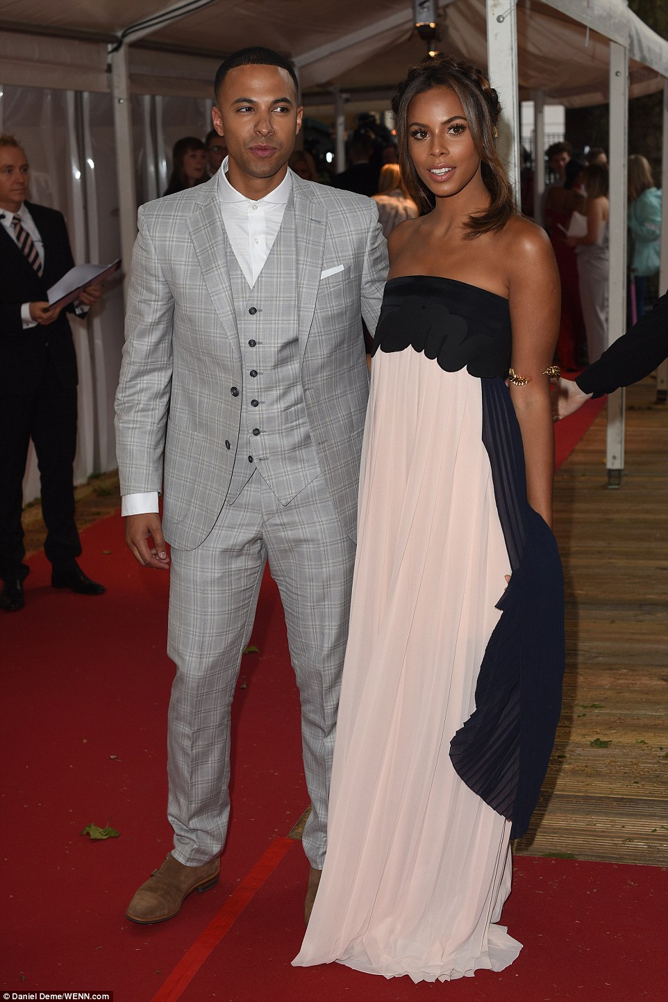 Date night: Rochelle  looked pretty in her pale pink and black number which featured a dramatic skirt, with The Saturdays star joined by her very dapper husband Marvin