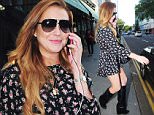 04.JUNE.2015 - LONDON - UK
*EXCLUSIVE ALL ROUND PICTURES*
AMERICAN ACTRESS LINDSAY LOHAN IS SEEN TALKING ON HER MOBILE PHONE AS SHE LEAVES THE IVY CHELSEA GARDEN RESTURANT WITH A FEMALE FRIEND IN LONDON.
LINDSAY SHOWED OFF HER LEGS IN A SHORT FLORAL DRESS AND BALCK LEATHER BOOTS.
BYLINE MUST READ : XPOSUREPHOTOS.COM
***UK CLIENTS - PICTURES CONTAINING CHILDREN PLEASE PIXELATE FACE PRIOR TO PUBLICATION ***
**UK CLIENTS MUST CALL PRIOR TO TV OR ONLINE USAGE PLEASE TELEPHONE 0208 344 2007**