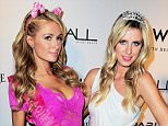 MIAMI BEACH, FL - JUNE 06:  Paris Hilton and Nicky Hilton (R) attend the Paris Hilton Debuts New Single at Wall at W Hotel on June 6, 2015 in Miami Beach, Florida.  (Photo by Sergi Alexander/Getty Images)