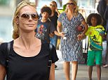 New York, NY - Heidi Klum and her brood walk to Nobu in Tribeca for an early dinner in New York. The model was dressed casual in distressed jeans, flip flops with messy hair and shades as she and her mother took the kids out.\n \nAKM-GSI   June  9, 2015\nTo License These Photos, Please Contact :\nSteve Ginsburg\n(310) 505-8447\n(323) 423-9397\nsteve@akmgsi.com\nsales@akmgsi.com\nor\nMaria Buda\n(917) 242-1505\nmbuda@akmgsi.com\nginsburgspalyinc@gmail.com
