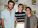 SAN DIEGO, CA - JULY 20:  (L-R) Actor Liam Hemsworth, actress Jennifer Lawrence and actor Josh Hutcherson appear at the Lionsgate preview featuring "I, Frankenstein" and "The Hunger Games: Catching Fire" during Comic-Con International 2013 at San Diego Convention Center on July 20, 2013 in San Diego, California.  (Photo by Albert L. Ortega/Getty Images)
