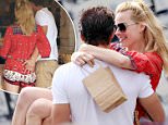 138564, EXCLUSIVE: Margot Robbie gets a visit from boyfriend Tom Ackerley, packing on the PDA in Toronto while she's in town shooting Suicide Squad. The pair obviously missed each other as were seen after lunch kissing and dancing inside the ice-cream shop, even sharing their desserts. As they were leaving for their car Tom scooped Margot up and the two started making out. Toronto, Canada - Thursday June 11, 2015. CANADA OUT Photograph: © PacificCoastNews. Los Angeles Office: +1 310.822.0419 sales@pacificcoastnews.com FEE MUST BE AGREED PRIOR TO USAGE
