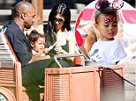Kim Kardashian and Kanye West take yuoung daughter North on the Tow Mater Ride. as they are spotted celebrating her 2nd birthday at Disneyland in Anaheim, Ca

Pictured: Kanye West, North West and Kim Kardashian
Ref: SPL1053608  150615  
Picture by: GoldenEye /London Entertainment

Splash News and Pictures
Los Angeles: 310-821-2666
New York: 212-619-2666
London: 870-934-2666
photodesk@splashnews.com