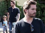 Scott Disick bonds with Mason on Father's Day taking his oldest son to Rosti for lunch and looks like he bought him a Lego  June 21, 2015 X17online.com