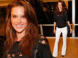 UK CLIENTS MUST CREDIT: AKM-GSI ONLY\nEXCLUSIVE: Rio de Janeiro, Brazil - Alessandra Ambrosio dons a cute, yet modern black  ripped blouse with white trousers and black leather heels, matching her tote bag, as she attends Ben Harper Concert in Rio.\n\nPictured: Alessandra Ambrosio\nRef: SPL1060222  210615   EXCLUSIVE\nPicture by: AKM-GSI / Splash News\n\n