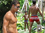 Picture Shows: Cristiano Ronaldo Jr., Cristiano Ronaldo  June 24, 2015
 
 Real Madrid soccer star, Cristiano Ronaldo is spotted hanging poolside with his son Cristiano Ronaldo Jr. in Miami, Florida. Cristiano can be seen teaching his son some soccer style moves with a beach ball. 
 
 Non-Exclusive
 UK RIGHTS ONLY
 
 Pictures by : FameFlynet UK © 2015
 Tel : +44 (0)20 3551 5049
 Email : info@fameflynet.uk.com
