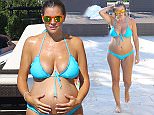 MUST BYLINE: EROTEME.CO.UK
Imogen Thomas shows off her baby bump in the South Beach Bikini from her chasingsummer.co.uk swimwear range while enjoying a sunshine break in Monaco with her partner Adam and their daughter Ariana.
EXCLUSIVE    June 26,  2015
Job: 150626L3    Monaco
EROTEME.CO.UK
44 207 431 1598
Ref:  341629