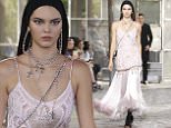 epa04820415 US model Kendall Jenner presents a creation from the Spring/Summer 2016 Menswear collection by Italian designer Riccardo Tisci for Givenchy during the Paris Men's Fashion Week, in Paris, France, 26 June 2015. The presentation of the Men's collections runs from 24 to 28 June.  EPA/GUILLAUME HORCAJUELO