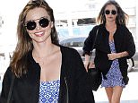 Picture Shows: Miranda Kerr  June 30, 2015.. .. Miranda Kerr departing on a flight from LAX airport in Los Angeles, California, looking summery in a blue dress... .. Non Exclusive.. UK RIGHTS ONLY.. .. Pictures by : FameFlynet UK © 2015.. Tel : +44 (0)20 3551 5049.. Email : info@fameflynet.uk.com