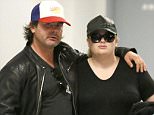 EXCLUSIVE: Rebel Wilson finally goes public with some PDA with her boyfriend, Mickey Gooch as the adorable couple arrive in Los Angeles.  The Australian comedian was casually dressed as she made her way to a waiting limo with her new beau. 

Pictured: Rebel Wilson, Mickey Gooch
Ref: SPL1066980  290615   EXCLUSIVE
Picture by: Sharky / Splash News

Splash News and Pictures
Los Angeles: 310-821-2666
New York: 212-619-2666
London: 870-934-2666
photodesk@splashnews.com