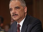 WASHINGTON, DC - MARCH 12:  U.S. Attorney General Eric Holder delivers remarks about the shooting of two police officers in Ferguson, Missouri, while announcing the first six pilot sites for the National Initiative for Building Community Trust and Justice at the Department of Justice March 12, 2015 in Washington, DC. Holder said the shooting of the officers was 'disgusting and cowardly' and called the perpetrator -- who is still at large -- a 'punk.'  (Photo by Chip Somodevilla/Getty Images)