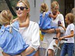 EXCLUSIVE: Kelly Rutherford walks around the Upper East Side neighborhood with her kids Hermes and Helena on the 4th of July day after reuniting with them in New York City.....Pictured: Kelly Rutherford, Hermes Giersch and Helena Giersch..Ref: SPL1070700  040715   EXCLUSIVE..Picture by: Splash News....Splash News and Pictures..Los Angeles: 310-821-2666..New York: 212-619-2666..London: 870-934-2666..photodesk@splashnews.com..