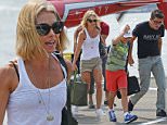 EXCLUSIVE: Kelly Ripa and her boys Joaquin and Antonio arrive at the VIP Heliport after a July 4 Weekend in the Hamptons in New York City.\n\nPictured: Kelly Ripa\nRef: SPL1071885  050715   EXCLUSIVE\nPicture by: Splash News\n\nSplash News and Pictures\nLos Angeles: 310-821-2666\nNew York: 212-619-2666\nLondon: 870-934-2666\nphotodesk@splashnews.com\n