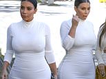 Westlake Village, CA - Kourtney Kardashian and her sisters Khloe and Kim Kardashian grabbed dinner at Casa Escobar in Westlake on Tuesday evening, dressed in all-white matching outfits. Kourtney appeared a bit glum, forcing a smile for the cameras after reports that she and her long-time partner Scott Disick have split this week when photos emerged of him canoodling with his ex-girlfriend in the South of France.\nAKM-GSI     July 7, 2015\nTo License These Photos, Please Contact :\nSteve Ginsburg\n(310) 505-8447\n(323) 423-9397\nsteve@akmgsi.com\nsales@akmgsi.com\nor\nMaria Buda\n(917) 242-1505\nmbuda@akmgsi.com\nginsburgspalyinc@gmail.com