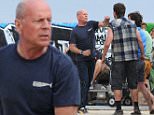 Bruce Willis beats up two 'beach bums' while filming in Venice Beach, Ca! The 60 year old action hero, proved he still had what it takes on set as he was seen wrestling a man to the ground while punching another in a beach brawl action set in Venice Beach. Bruce was seen filming scenes earlier in the day at the skate park and kept covered under a fedora hat between takes!\n\nPictured: Bruce Willis\nRef: SPL1072378  060715  \nPicture by: Splash News\n\nSplash News and Pictures\nLos Angeles: 310-821-2666\nNew York: 212-619-2666\nLondon: 870-934-2666\nphotodesk@splashnews.com\n