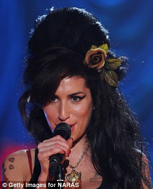 Amy Winehouse, who died in 2011, came second in the poll for her dramatic beehive