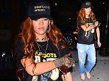Rihanna was spotted arriving at an NYC recording studio for a 2am session. She arrived with her tall bodyguard following close behind her, and wore boyfriend jeans and a black tee shirt that said "Playboys", with scantily clad women on it.

Pictured: Rihanna
Ref: SPL1072410  060715  
Picture by: 247PAPS.TV / Splash News

Splash News and Pictures
Los Angeles: 310-821-2666
New York: 212-619-2666
London: 870-934-2666
photodesk@splashnews.com
