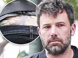 Picture Shows: Ben Affleck  July 04, 2015\n \n **NO Web till 10.30 am PST **\n \n ** min web / online fee £1k for set **\n \n While estranged wife Jennifer Garner and the children spend the 4th of July together in the Bahamas, Ben Affleck cuts a lonely figure as he drives around aimlessly in Los Angeles. \n \n With the harsh reality of the separation and the repercussions of his actions cearly sinking in, Affleck appeared sad and despondent as he took turns driving around his neighborhood on his motorcycle and later, in his truck. While he was seen wearing his wedding band the day before in the Bahamas, he removed it upon his return home. \n \n **NO WEb till 10.30 am PST **\n \n ** min web / online fee £1k for set **\n \n Exclusive All Rounder\n UK RIGHTS ONLY\n Pictures by : FameFlynet UK © 2015\n Tel : +44 (0)20 3551 5049\n Email : info@fameflynet.uk.com