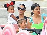 Newly Singl Kourtney kardashian and Pregnant Kim Kardashian celebrate Penelope disick's birthday at Disneyland. the girls were also joined by their mother Kris who had a great time on the dumbo ride. the group were also seen riding the alice in wonderland ride and the carousel

Pictured: Kim Kardashian, Kourtney Kardashian, North West, Penelope disick, Kris Jenner, Mason Disick
Ref: SPL1072689  080715  
Picture by: Fern / Splash News

Splash News and Pictures
Los Angeles: 310-821-2666
New York: 212-619-2666
London: 870-934-2666
photodesk@splashnews.com