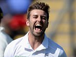 CARDIFF, WALES - JULY 09:  Mark Wood of England celebrates dismissing Chris Rogers of Australia during day two of the 1st Investec Ashes Test match between England and Australia at SWALEC Stadium on July 9, 2015 in Cardiff, United Kingdom.  (Photo by Gareth Copley/Getty Images)