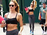 ***MANDATORY BYLINE TO READ INFPhoto.com ONLY***\nCandice Swanepoel shows off her impressive figure after a workout session today in New York City.\n\nPictured: Candice Swanepoel\nRef: SPL1074221  080715  \nPicture by: Alberto Reyes/INFphoto.com\n\n
