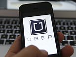 A file illustration picture shows the logo of car-sharing service app Uber on a smartphone next to the picture of an official German taxi sign in Frankfurt on 15 September 2014. 
A German court is set to rule March 18, 2015, whether Uber's novel taxi-hailing service violates driver licensing rules, a decision that could lead to a nationwide ban on the service. The case in a Frankfurt court brought by German taxi operator group Taxi Deutschland against Uber is one of more than a dozen lawsuits filed across Europe in recent months by taxi industry associations against the San Francisco-based company. Taxi drivers around the world consider Uber unfairly bypasses local licensing and safety regulations by using the internet to put drivers in touch with passengers. 

REUTERS/Kai Pfaffenbach/Files  (GERMANY  - Tags: BUSINESS EMPLOYMENT CRIME LAW TRANSPORT)