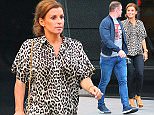 Wayne and Coleen Rooney celebrate the news that their 3rd child is on the way by going for a meal at Tattu Bar & Restaurant in Manchester city centre on Thursday night. Coleen was wearing a leopard print top, skin tight black jeans and high heel shoes while Wayne went more casual in jeans, trainers and a GOD FATHER t-shirt under his navy jacket....... 9.7.15.