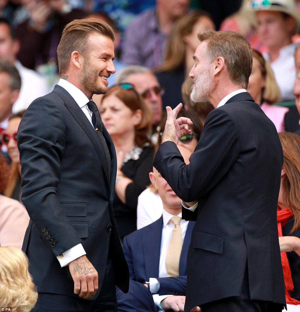 Conversation: Beckham and Adam Crozier, chief executive of ITV, in the Royal Box during day ten of the Wimbledon Championships 