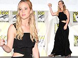 SAN DIEGO, CA - JULY 09:  Actress Jennifer Lawrence walks onstage at the "The Hunger Games: Mockingjay Part 2" panel during Comic-Con International 2015 at the San Diego Convention Center on July 9, 2015 in San Diego, California.  (Photo by Albert L. Ortega/Getty Images)