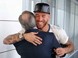 Ramos, the subject of a failed bid by Manchester United, hugs president Florentino Perez earlier in the week