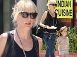 Kimberly Stewart, daughter of rock legend Rod Stewart, was spotted while out walking with her daughter, Delilah, by actor Benicio Del Toro.  Kimberly wore jeans with a black tank top, while Delilah went with a floral top and shorts.  Saturday, July 11, 2015 X17online.com