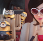 In this image released by Universal Pictures, characters, from left, Stuart, Bob, Kevin and Scarlet Overkill, voiced by Sandra Bullock, appear in a scene from the animated feature, "Minions." (Illumination Entertainment/Universal Pictures via AP)