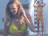 Picture Shows: Elle MacPherson  July 11, 2015\n \n Australian supermodel Elle MacPherson is seen relaxing on board a mega yacht in Monte Carlo, Monaco.\n \n The fifty-one year-old, nicknamed 'The Body' for her impressive physique, showed off the figure that made her famous in a green bikini as she enjoyed some quality time with her husband Jeffrey Soffer.\n \n Exclusive\n UK RIGHTS ONLY\n FameFlynet UK © 2015\n Tel : +44 (0)20 3551 5049\n Email : info@fameflynet.uk.com