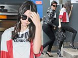 Picture Shows: Kendall Jenner  July 12, 2015\n \n Reality television stars Kris and Kendall Jenner arrive at Heathrow Airport in London, England.\n \n The mother and daughter duo chose vastly different outfits, with mother Kris in an eye-catching camo ensemble that included multi-coloured splat prints; whereas Kendall opted for a more reserved approach.\n \n Non Exclusive\n WORLDWIDE RIGHTS\n \n Pictures by : FameFlynet UK © 2015\n Tel : +44 (0)20 3551 5049\n Email : info@fameflynet.uk.com