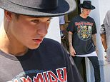 UK CLIENTS MUST CREDIT: AKM-GSI ONLY\nEXCLUSIVE: Pop superstar Justin Bieber, who has been slammed by heavy metal fans for wearing a METALLICA t-shirt, has done it again! This time the Canadian singer stepped out with an Iron Maiden Classic Graphic Tee as he visited Portofino Skin Care for some pampering time. The members of METALLICA were asked in a 2013 issue of Q magazine if they were "Beliebers" ø a.k.a. fans of Justin Bieber ø after Bieber claimed that the METALLICA songs "One" and "Fade To Black" were his "jams." Frontman James Hetfield replied, "Are we Beliebers? Yes." while drummer Lars Ulrich offered: "Is it possible to have respect for him without being a Belieber?\n**MANDATORY CREDIT MUST READ: FameFlynet/AKM-GSI**\n\nPictured: Justin Bieber\nRef: SPL1077267  120715   EXCLUSIVE\nPicture by: AKM-GSI / Splash News\n\n