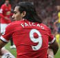 MANCHESTER, ENGLAND - MAY 17:  Radamel Falcao of Manchester United sits on the pitch during the Barclays Premier League match between Manchester United and Arsenal at Old Trafford on May 17, 2015 in Manchester, England.  (Photo by John Peters/Man Utd via Getty Images)