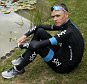 Team Sky rider Chris Froome of Britain, the race leader's yellow jersey, poses for the media at his hotel in Pau during a rest day in the 102nd Tour de France cycling race, July 13, 2015. REUTERS/Benoit Tessier