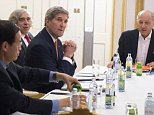 US Secretary of State John Kerry (2nd R), US Secretary of Energy Ernest Moniz (3rd R) and French Foreign Minister Laurent Fabius (R) meet at the Palais Coburg Hotel, where the Iran nuclear talks are being held, in Vienna, Austria on July 14, 2015. Major powers have struck a long-awaited nuclear deal with Iran after more than two weeks of intense talks in Vienna, a diplomat close to the negotiations said.    AFP PHOTO / POOL / JOE KLAMARJOE KLAMAR/AFP/Getty Images
