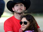 FILE  JULY 05, 2015: According to reports, Mila Kunis and Ashton Kutcher married over the 4th of July weekend. Their representatives have not confirmed if they are married or not. Kunis and Kutcher worked together on That 70s Show from 1998-2006. They became a couple in 2012 and their daughter was born in 2014. INDIO, CA - APRIL 25:  Actors Ashton Kutcher and Mila Kunis attend day 1 of 2014 Stagecoach: California's Country Music Festival at the Empire Polo Club on April 25, 2014 in Indio, California.  (Photo by Frazer Harrison/Getty Images for Stagecoach)