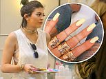 Beverly Hills, CA - Kylie Jenner gets pampered at Nail Bar and Beauty Lounge in Beverly Hills, she wore a white tee with a brown leather jacket on top, skinny jeans and gray heels. \nAKM-GSI     July 13, 2015\nTo License These Photos, Please Contact :\nSteve Ginsburg\n(310) 505-8447\n(323) 423-9397\nsteve@akmgsi.com\nsales@akmgsi.com\nor\nMaria Buda\n(917) 242-1505\nmbuda@akmgsi.com\nginsburgspalyinc@gmail.com