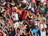 CARDIFF, WALES - JULY 12:  Fans celebrate after England secured the draw during day five of the npower 1st Ashes Test Match between England and Australia at the SWALEC Stadium on July 12, 2009 in Cardiff, Wales.  (Photo by Tom Shaw/Getty Images)